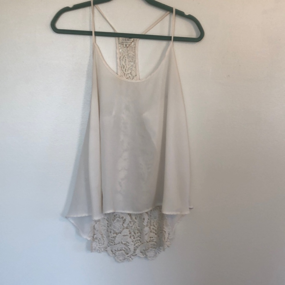 Cream razor back tank top. La hearts size medium